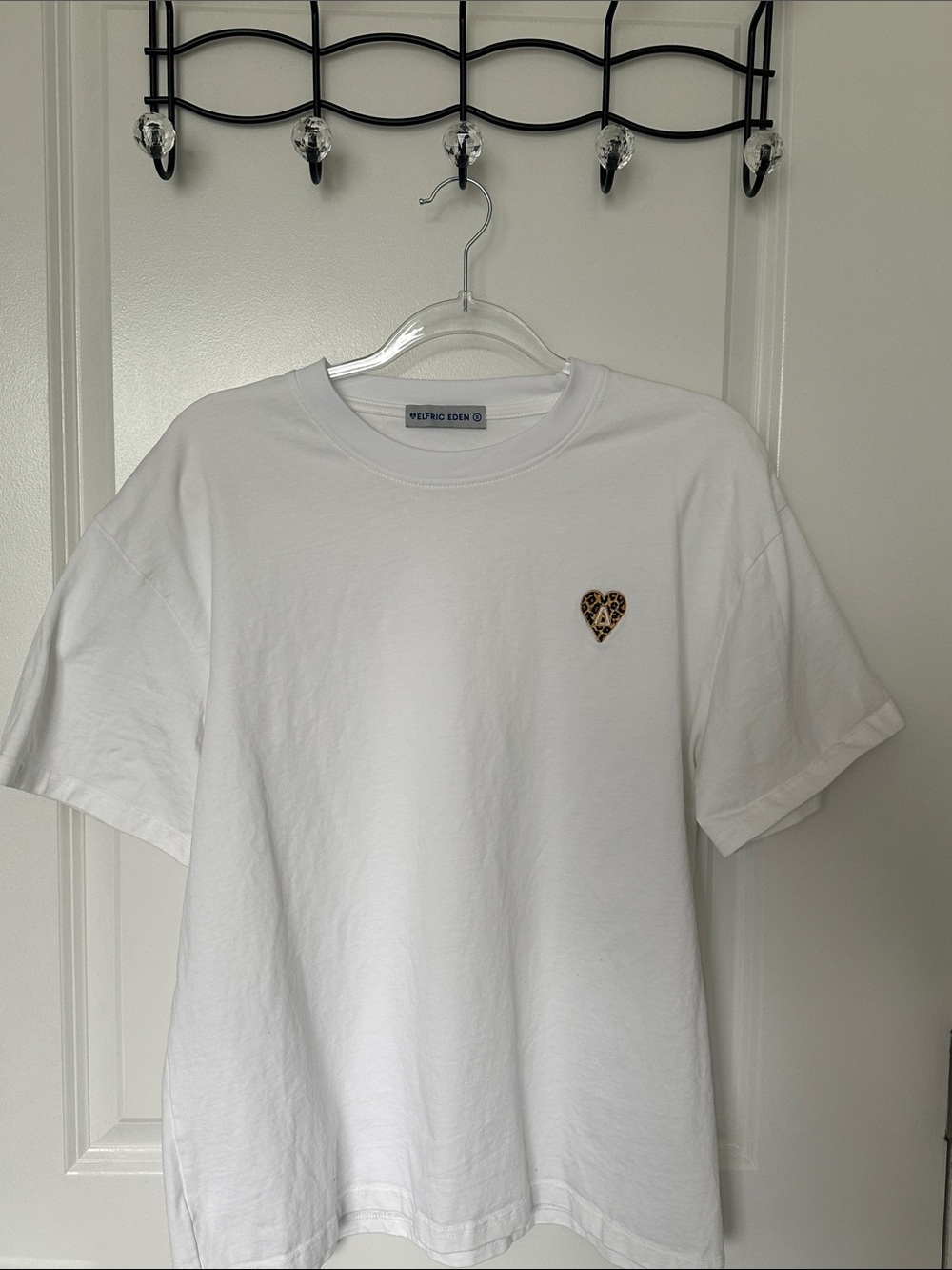 Over sized white tee with cheetah print logo